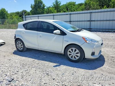 Czwarte zdjęcie samochodu z boku: 2013 TOYOTA PRIUS C TWO VIN:JTDKDTB35D1541051 - miniatura