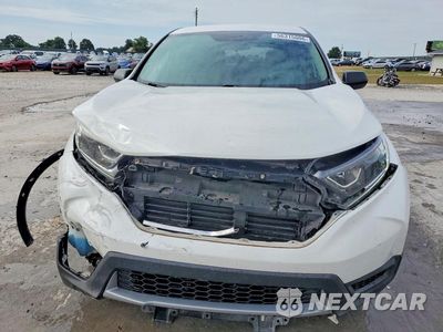 Piąte zdjęcie samochodu w środku: 2019 HONDA CR-V LX VIN:2HKRW6H3XKH229296 - miniatura