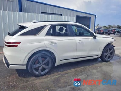Trzecie zdjęcie samochodu z tyłu: 2023 GENESIS GV70 2.5T STANDARD VIN:KMUMADTBXPU124375 - miniatura