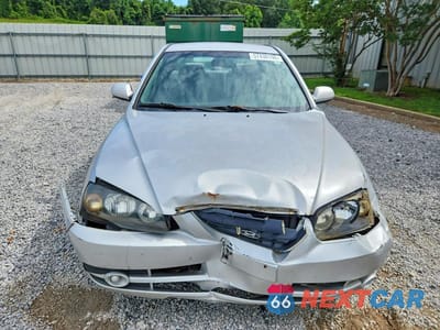 Piąte zdjęcie samochodu w środku: 2004 HYUNDAI ELANTRA GLS VIN:KMHDN46D94U863894 - miniatura