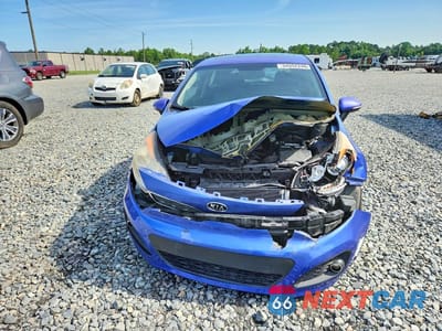 Piąte zdjęcie samochodu w środku: 2012 KIA RIO 5-DOOR SX VIN:KNADN5A34C6095329 - miniatura