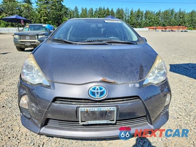 Piąte zdjęcie samochodu w środku: 2014 TOYOTA PRIUS C TWO VIN:JTDKDTB38E1073334 - miniatura