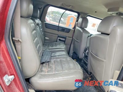 Zdjęcie 11 z 13 samochodu: 2003 HUMMER H2 VIN:5GRGN23U53H138681 - miniatura