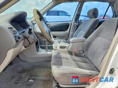 Zdjęcie 7 z 12 samochodu: 2001 TOYOTA COROLLA LE VIN:1NXBR12E31Z462930 - miniatura
