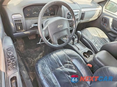 Zdjęcie 8 z 13 samochodu: 2003 JEEP GRAND CHEROKEE LAREDO VIN:1J4GW48S63C524597 - miniatura