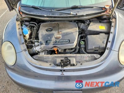 Zdjęcie 11 z 12 samochodu: 2004 VOLKSWAGEN NEW BEETLE GLS VIN:3VWCD31C04M411670 - miniatura