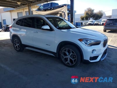 Czwarte zdjęcie samochodu z boku: 2018 BMW X1 SDRIVE28I VIN:WBXHU7C37J5H40662 - miniatura