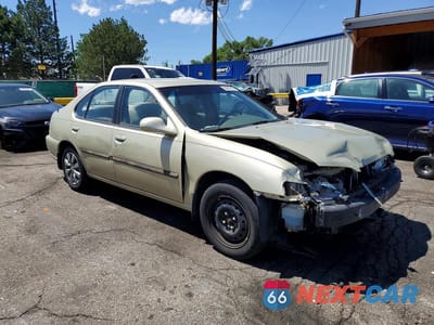 Czwarte zdjęcie samochodu z boku: 1999 NISSAN ALTIMA XE VIN:1N4DL01D5XC192086 - miniatura