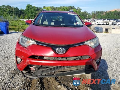 Piąte zdjęcie samochodu w środku: 2016 TOYOTA RAV4 XLE VIN:JTMWFREV0GJ070037 - miniatura