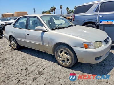 Czwarte zdjęcie samochodu z boku: 2002 TOYOTA COROLLA LE VIN:1NXBR12E52Z584769 - miniatura