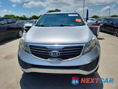 Piąte zdjęcie samochodu w środku: 2012 KIA SPORTAGE LX VIN:KNDPB3A28C7261057 - miniatura