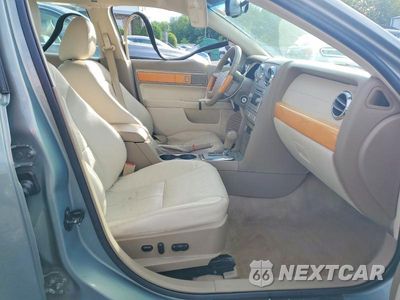Zdjęcie 7 z 12 samochodu: 2009 LINCOLN MKZ VIN:3LNHM26T49R634439 - miniatura