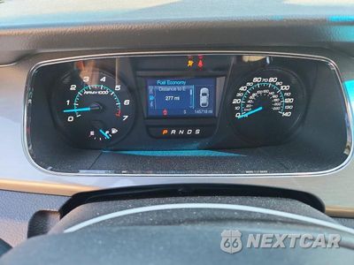 Zdjęcie 9 z 12 samochodu: 2014 FORD TAURUS SEL VIN:1FAHP2H83EG178896 - miniatura