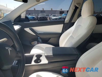 Zdjęcie 7 z 13 samochodu: 2022 TESLA MODEL Y VIN:7SAYGAEE6NF489086 - miniatura