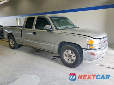 Czwarte zdjęcie samochodu z boku: 2002 GMC NEW SIERRA C1500 VIN:2GTEC19T121230458 - miniatura