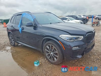 Czwarte zdjęcie samochodu z boku: 2021 BMW X5 XDRIVE40I VIN:5UXCR6C03M9G80450 - miniatura