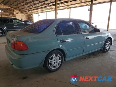 Trzecie zdjęcie samochodu z tyłu: 1999 HONDA CIVIC LX VIN:2HGEJ6676XH546447 - miniatura
