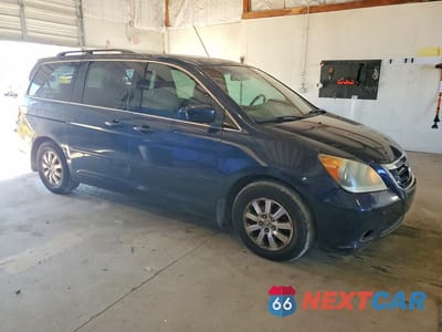 Czwarte zdjęcie samochodu z boku: 2010 HONDA ODYSSEY EXL VIN:5FNRL3H72AB031318 - miniatura