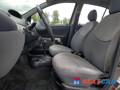 Zdjęcie 7 z 12 samochodu: 2003 TOYOTA ECHO BASE VIN:JTDBT123235053206 - miniatura