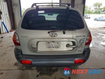 Zdjęcie 6 z 13 samochodu: 2004 HYUNDAI SANTA FE GLS VIN:KM8SC73D54U814257 - miniatura