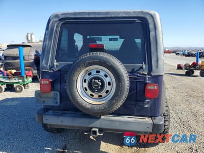 Zdjęcie 6 z 12 samochodu: 1999 JEEP WRANGLER VIN:1J4FY29P2XP472503 - miniatura