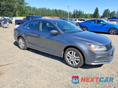 Czwarte zdjęcie samochodu z boku: 2018 VOLKSWAGEN JETTA S VIN:3VW2B7AJ4JM239016 - miniatura