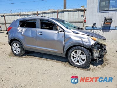 Czwarte zdjęcie samochodu z boku: 2012 KIA SPORTAGE EX VIN:KNDPCCA26C7207057 - miniatura