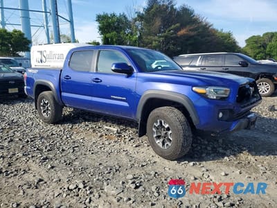 Czwarte zdjęcie samochodu z boku: 2023 TOYOTA TACOMA TRD OFF-ROAD VIN:3TMCZ5AN7PM633564 - miniatura