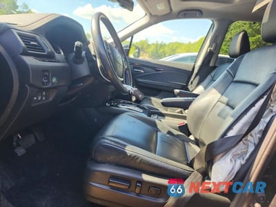Zdjęcie 7 z 13 samochodu: 2016 HONDA PILOT TOURING VIN:5FNYF6H90GB035320 - miniatura
