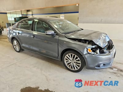 Czwarte zdjęcie samochodu z boku: 2011 VOLKSWAGEN JETTA SEL VIN:3VWLX7AJ4BM309217 - miniatura
