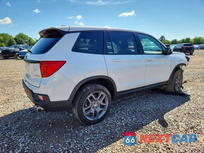 Trzecie zdjęcie samochodu z tyłu: 2023 HONDA PASSPORT EXL VIN:5FNYF8H57PB002758 - miniatura