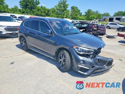 Czwarte zdjęcie samochodu z boku: 2016 BMW X1 XDRIVE28I VIN:WBXHT3C34GP880853 - miniatura