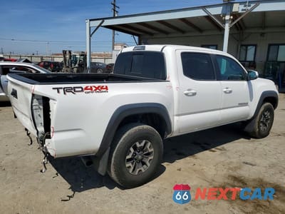Trzecie zdjęcie samochodu z tyłu: 2021 TOYOTA TACOMA TRD OFF-ROAD VIN:3TMCZ5AN1MM387431 - miniatura