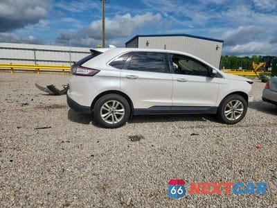 Trzecie zdjęcie samochodu z tyłu: 2016 FORD EDGE SEL VIN:2FMPK4J93GBB88367 - miniatura
