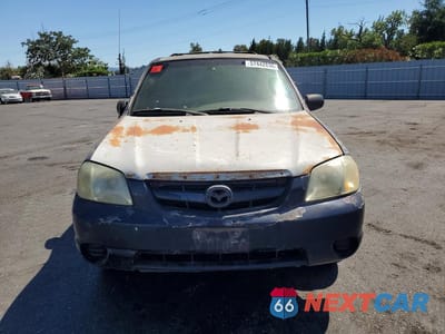 Piąte zdjęcie samochodu w środku: 2004 MAZDA TRIBUTE DX VIN:4F2YZ02B34KM03925 - miniatura