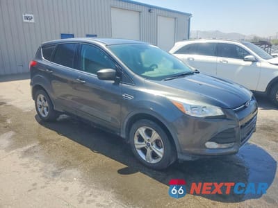 Czwarte zdjęcie samochodu z boku: 2016 FORD ESCAPE SE VIN:1FMCU0GX6GUC00190 - miniatura