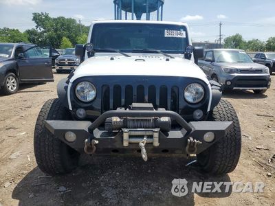 Piąte zdjęcie samochodu w środku: 2015 JEEP WRANGLER SPORT VIN:1C4AJWAGXFL572054 - miniatura