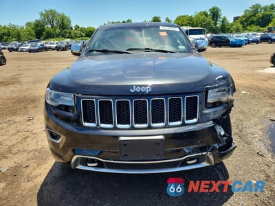 Piąte zdjęcie samochodu w środku: 2014 JEEP GRAND CHEROKEE OVERLAND VIN:1C4RJECGXEC410191 - miniatura