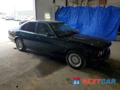 Czwarte zdjęcie samochodu z boku: 1994 BMW 525 I AUTOMATIC VIN:WBAHD6322RGK42538 - miniatura