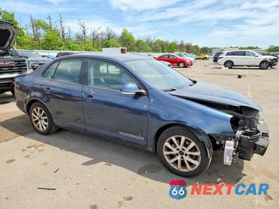 Czwarte zdjęcie samochodu z boku: 2010 VOLKSWAGEN JETTA LIMITED VIN:3VWAZ7AJ6AM123341 - miniatura