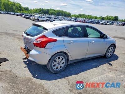 Trzecie zdjęcie samochodu z tyłu: 2012 FORD FOCUS SE VIN:1FAHP3K24CL124957 - miniatura