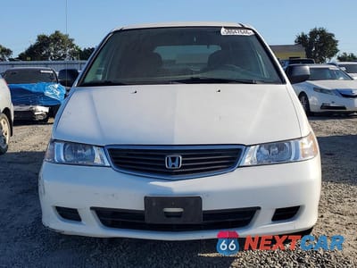 Piąte zdjęcie samochodu w środku: 2000 HONDA ODYSSEY LX VIN:2HKRL1855YH585659 - miniatura