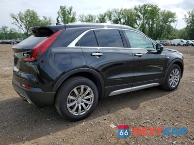 Trzecie zdjęcie samochodu z tyłu: 2021 CADILLAC XT4 PREMIUM LUXURY VIN:1GYFZDR43MF070456 - miniatura