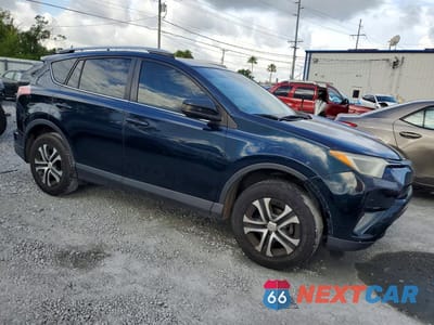 Czwarte zdjęcie samochodu z boku: 2018 TOYOTA RAV4 LE VIN:JTMZFREV5JJ168386 - miniatura