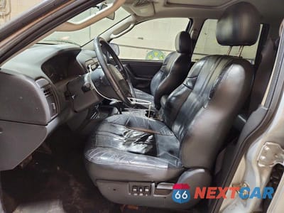 Zdjęcie 7 z 13 samochodu: 2003 JEEP GRAND CHEROKEE LAREDO VIN:1J4GW48S63C524597 - miniatura