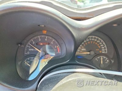 Zdjęcie 9 z 12 samochodu: 2003 PONTIAC GRAND AM GT VIN:1G2NW12E83C246210 - miniatura