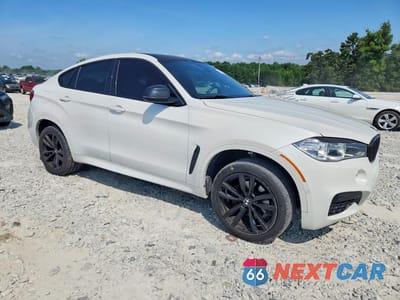 Czwarte zdjęcie samochodu z boku: 2019 BMW X6 XDRIVE35I VIN:5UXKU2C59K0Z64050 - miniatura