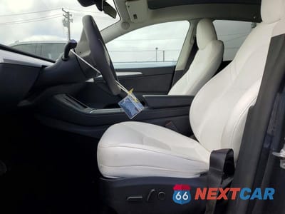 Zdjęcie 7 z 13 samochodu: 2023 TESLA MODEL Y VIN:7SAYGDEE0PF840045 - miniatura
