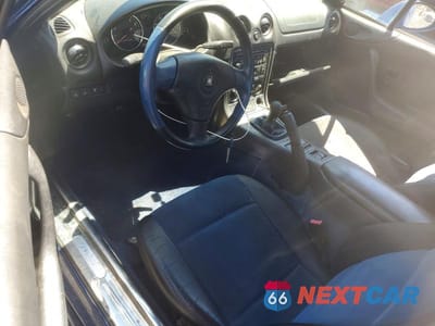 Zdjęcie 8 z 12 samochodu: 1999 MAZDA MX-5 MIATA VIN:JM1NB3539X0133743 - miniatura