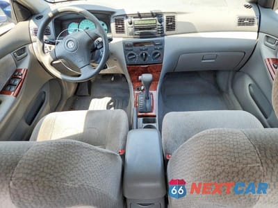 Zdjęcie 8 z 12 samochodu: 2003 TOYOTA COROLLA LE VIN:JTDBR32E030044366 - miniatura